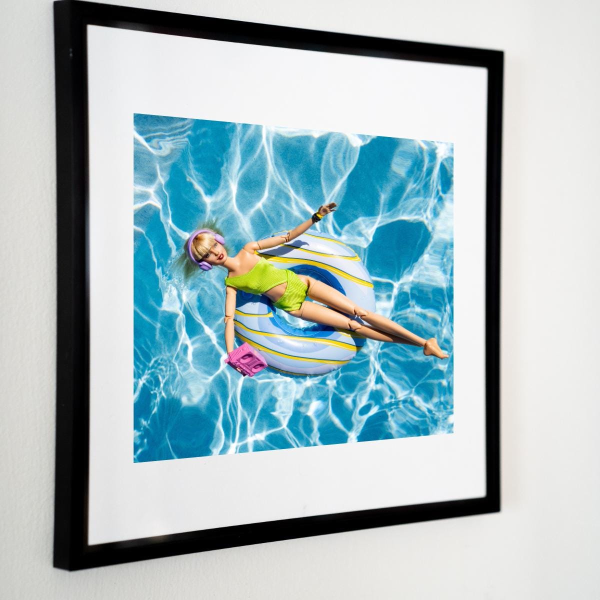 Fun Doll Pool Float Art Print – Vibrant Summer Photography