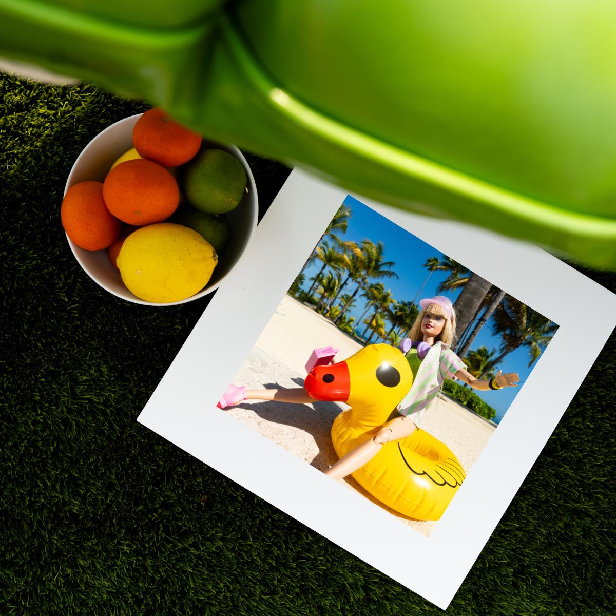Retro Doll Ducky Pool Float Art Print – Vibrant Summer Photography