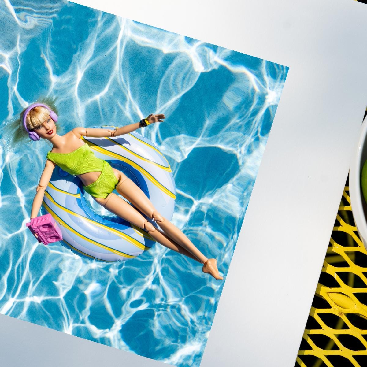 Fun Doll Pool Float Art Print – Vibrant Summer Photography