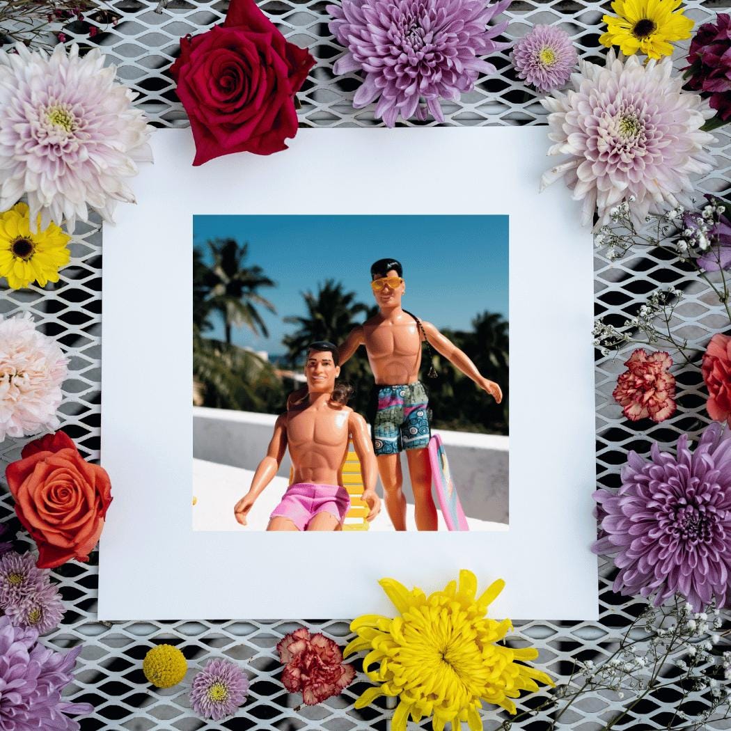 A framed fine art print featuring two vintage dolls  from the band new kid on the block dolls in retro swimwear, posed in a tropical rooftop setting with palm trees and a bright blue sky. The artwork is surrounded by an assortment of colorful flowers, including roses, chrysanthemums, and daisies, creating a vibrant and playful contrast. A bold and nostalgic decor piece that blends retro charm with artistic flair.