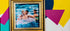 Three vintage New Kids on the Block dolls floating on inflatable pool rings in splashing blue water, with bright summer lighting and playful retro vibes in gold frame on bright mural wall.